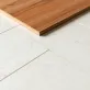 Czy na płytki można położyć panele laminowane
